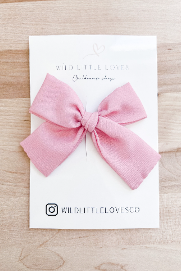 Girls Pink hand tied bow