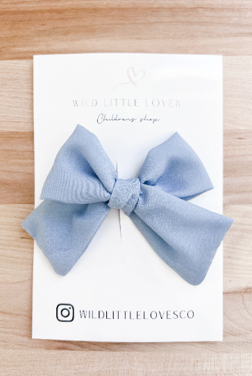 Girls Blue hand tied bow
